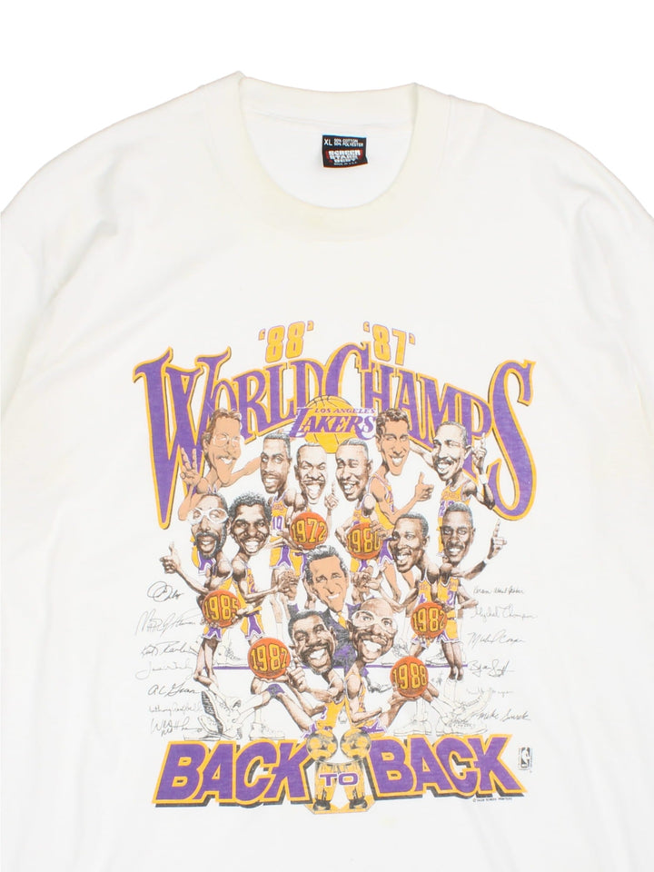 Vintage Los Angeles Lakers NBA World Champs Salem Screen Printers T-Shirt in white with team cartoon graphic and spell out printed on the front.