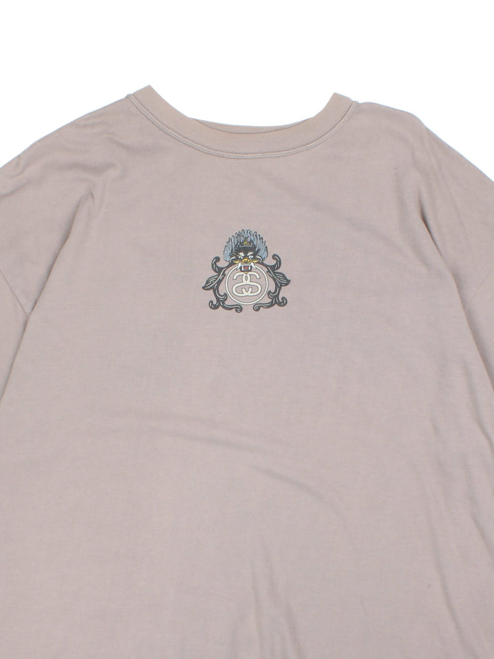 Stussy T-Shirt in grey with graphic printed on the front and the back.