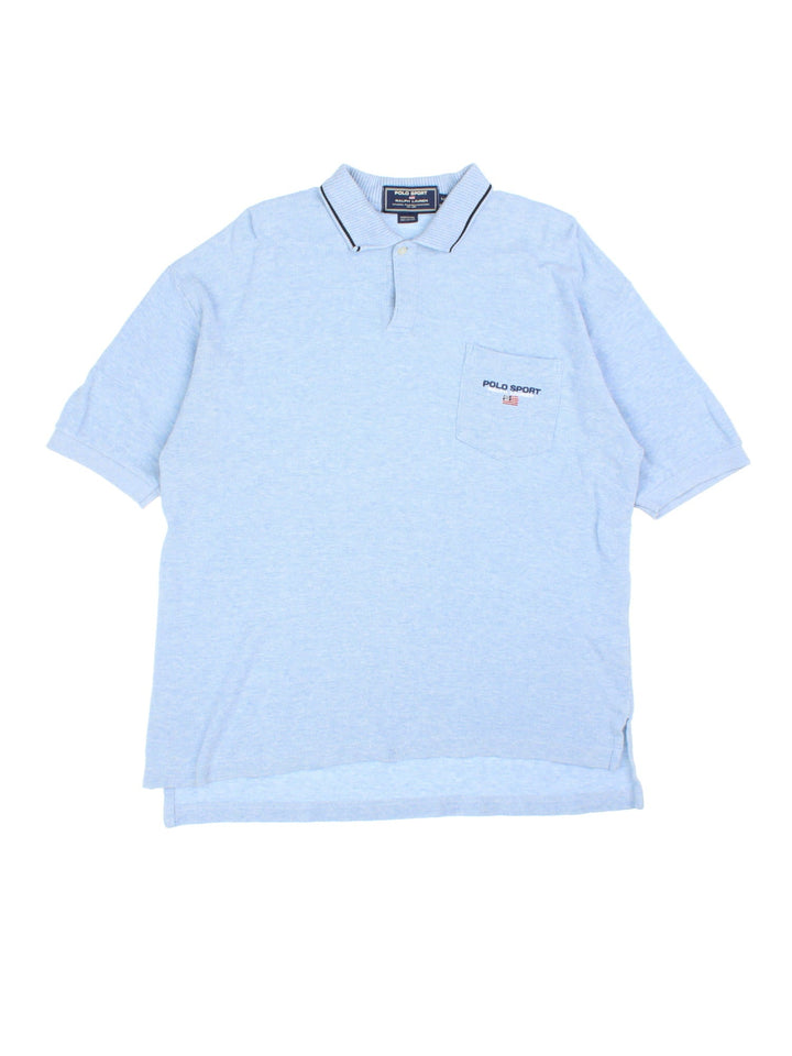 Ralph Lauren Polo Shirt in blue with the logo embroidered on the front and navy blue collar detail.