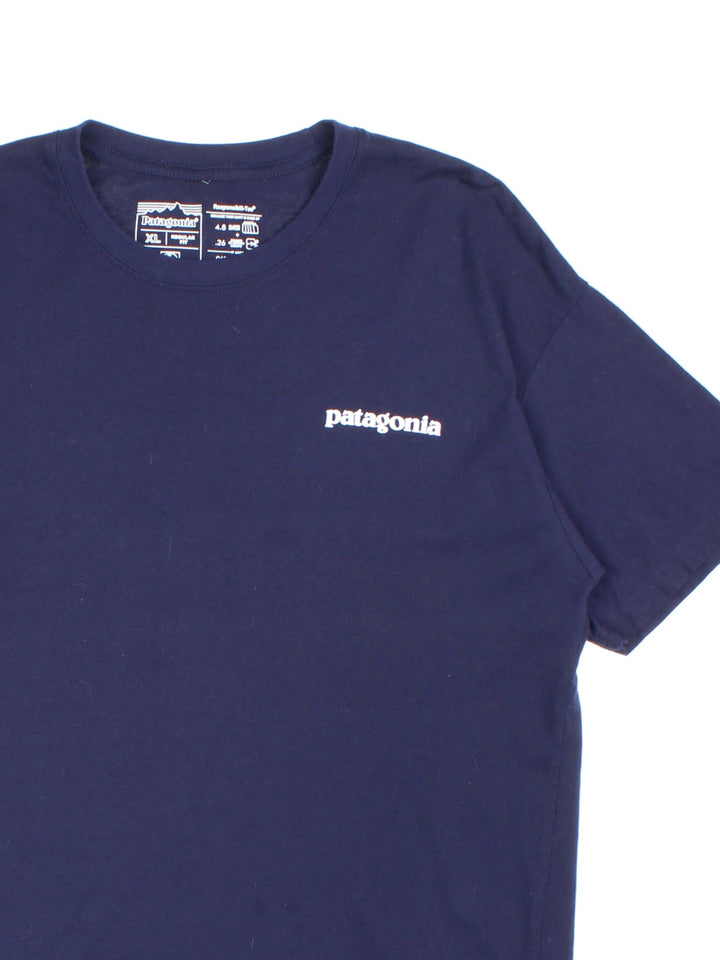 Patagonia P-6 Logo T-Shirt in a blue colourway with the small classic logo on the front and large graphic on the back.