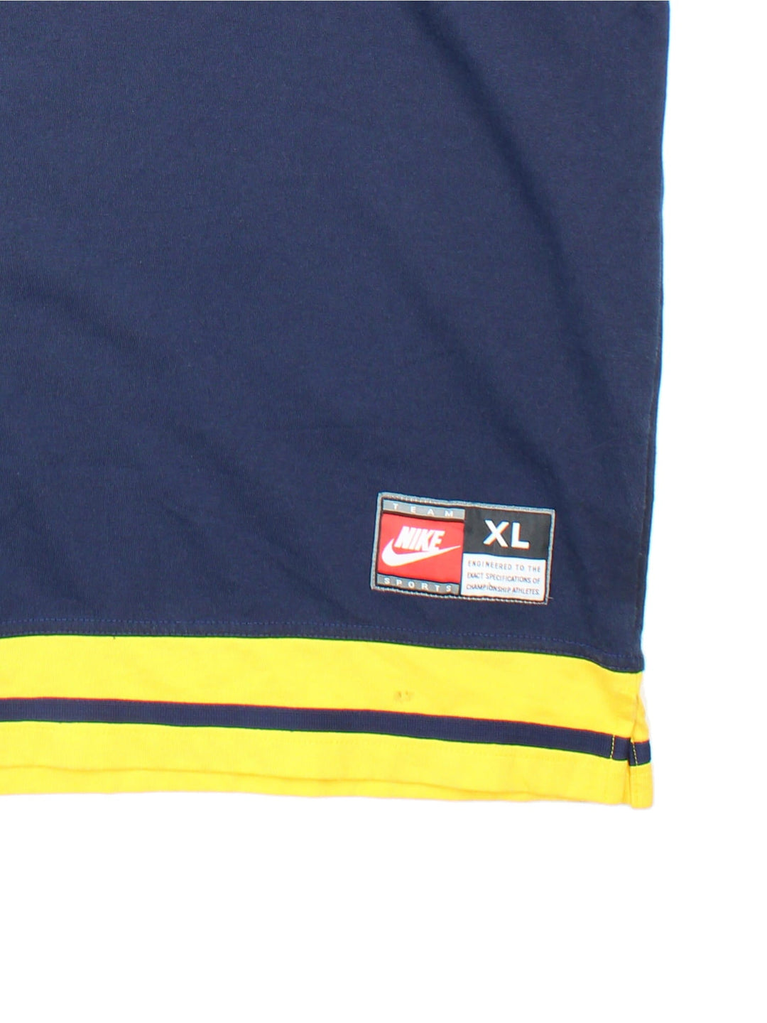 Michigan University Nike Wolverines Basketball Shooting Training Top in a navy blue and yellow colourway, button up collar and has the logos embroidered on the front.