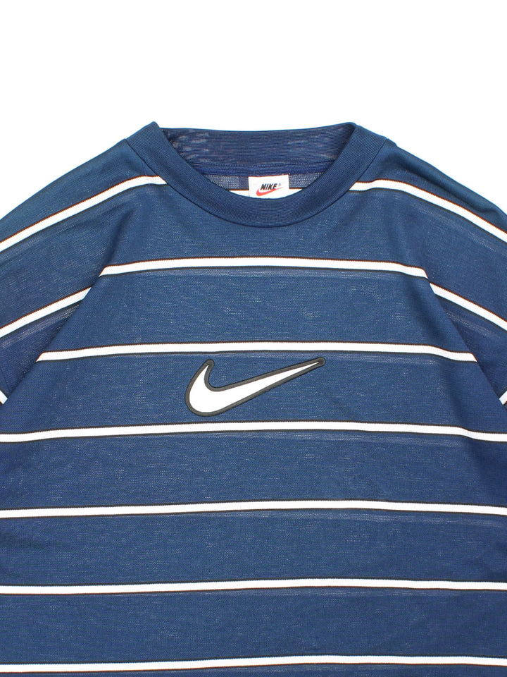 Vintage 90's Nike Training Top in a navy blue and white striped colourway with the swoosh logo embroidered on the front.