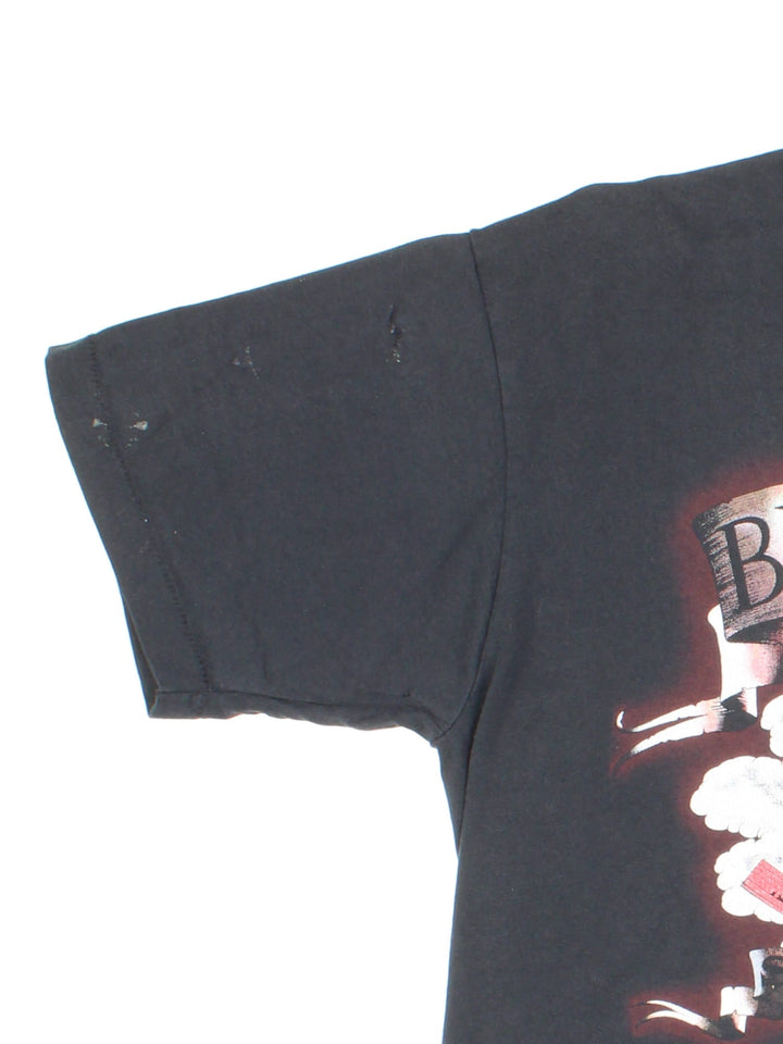 Vintage Billy Joel 1990 Storm Front Tour T-Shirt in black with graphic printed on the front and back.