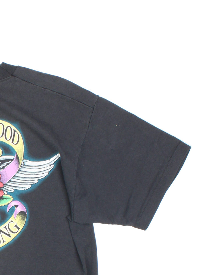 Vintage Billy Joel 1990 Storm Front Tour T-Shirt in black with graphic printed on the front and back.