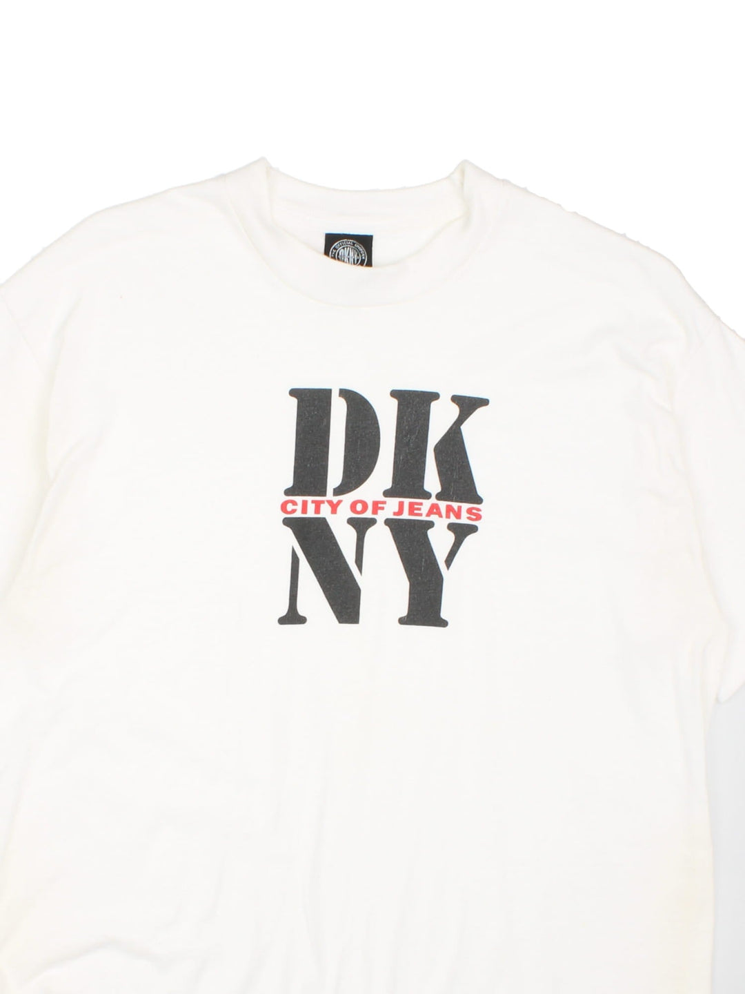 Vintage DKNY City of Jeans T-Shirt in white with the logo graphic printed on the front.