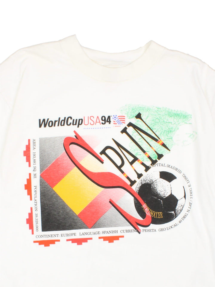 1994 Vintage USA World Cup Spain T-Shirt in white with graphic printed on the front and World Cup USA badge on the sleeve.