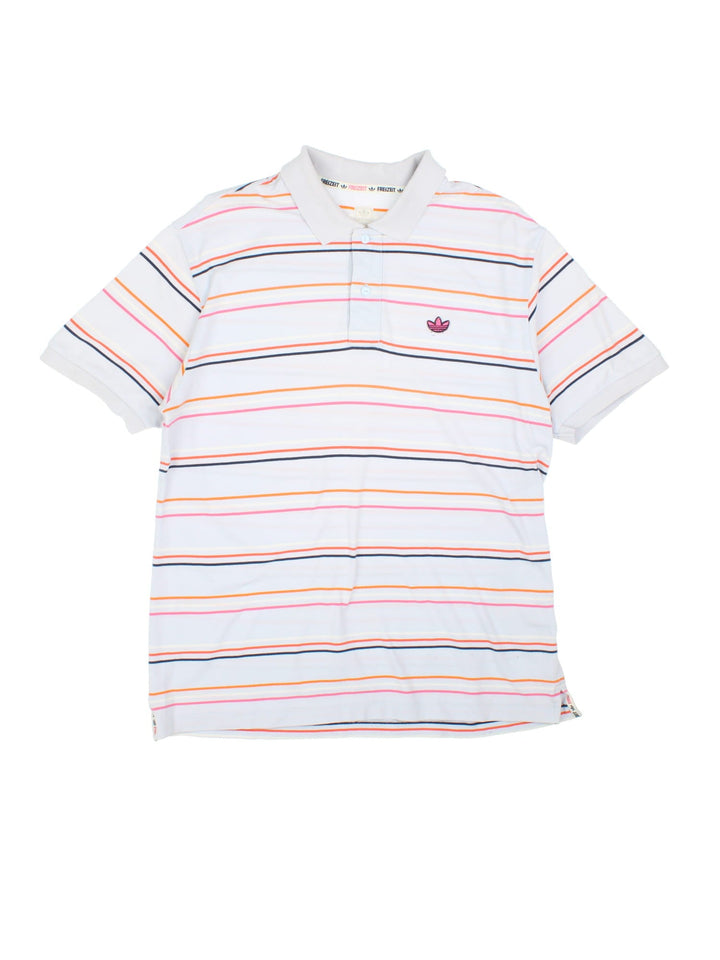 Vintage Adidas Polo Shirt in a grey colourway with orange, white and pink stripe and embroidered logo on the front.