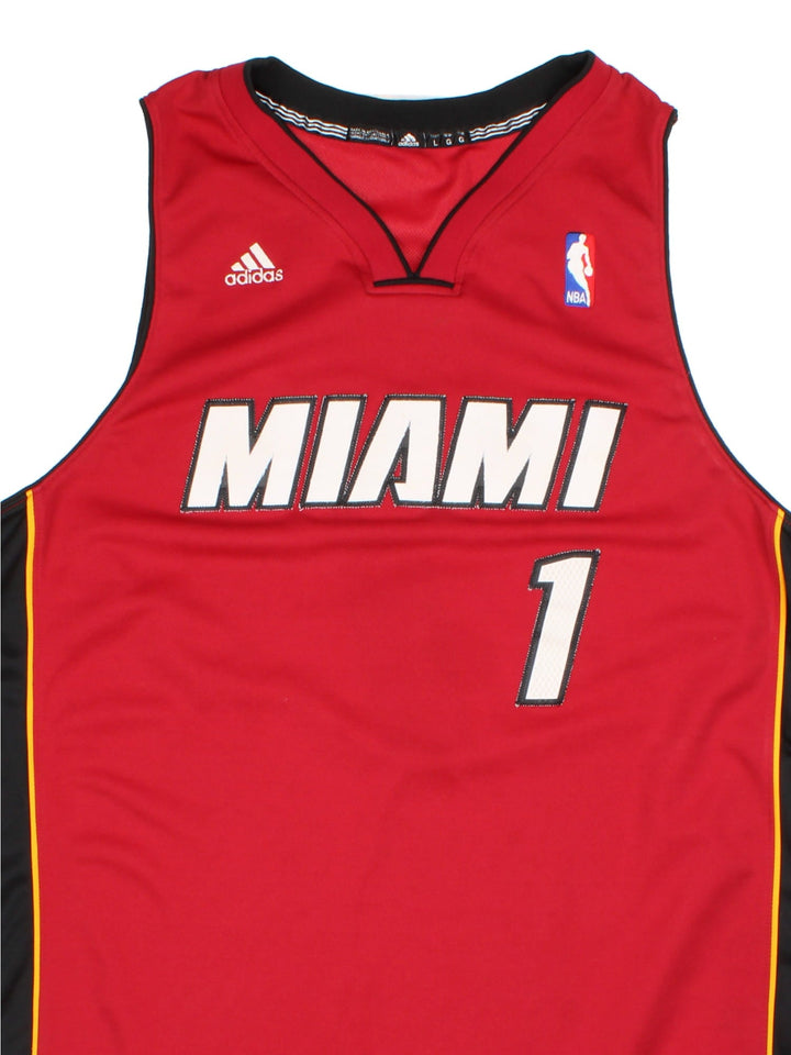 Miami Heat Adidas NBA Jersey in the red home kit colourway, features player name BOSH and numvber #1 and classic logo across the front.