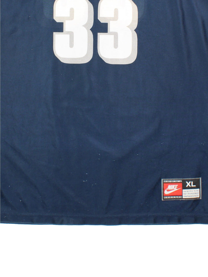 Georgetown Hoyas Nike Basketball Jersey in the blue home kit colourway, features team name across the front and traditional Patrick Ewings number #33.