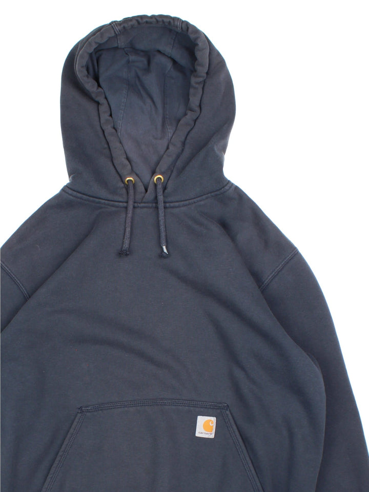 Carhartt Pullover Hoodie in a blue colourway with large pocket and classic logo on the front.