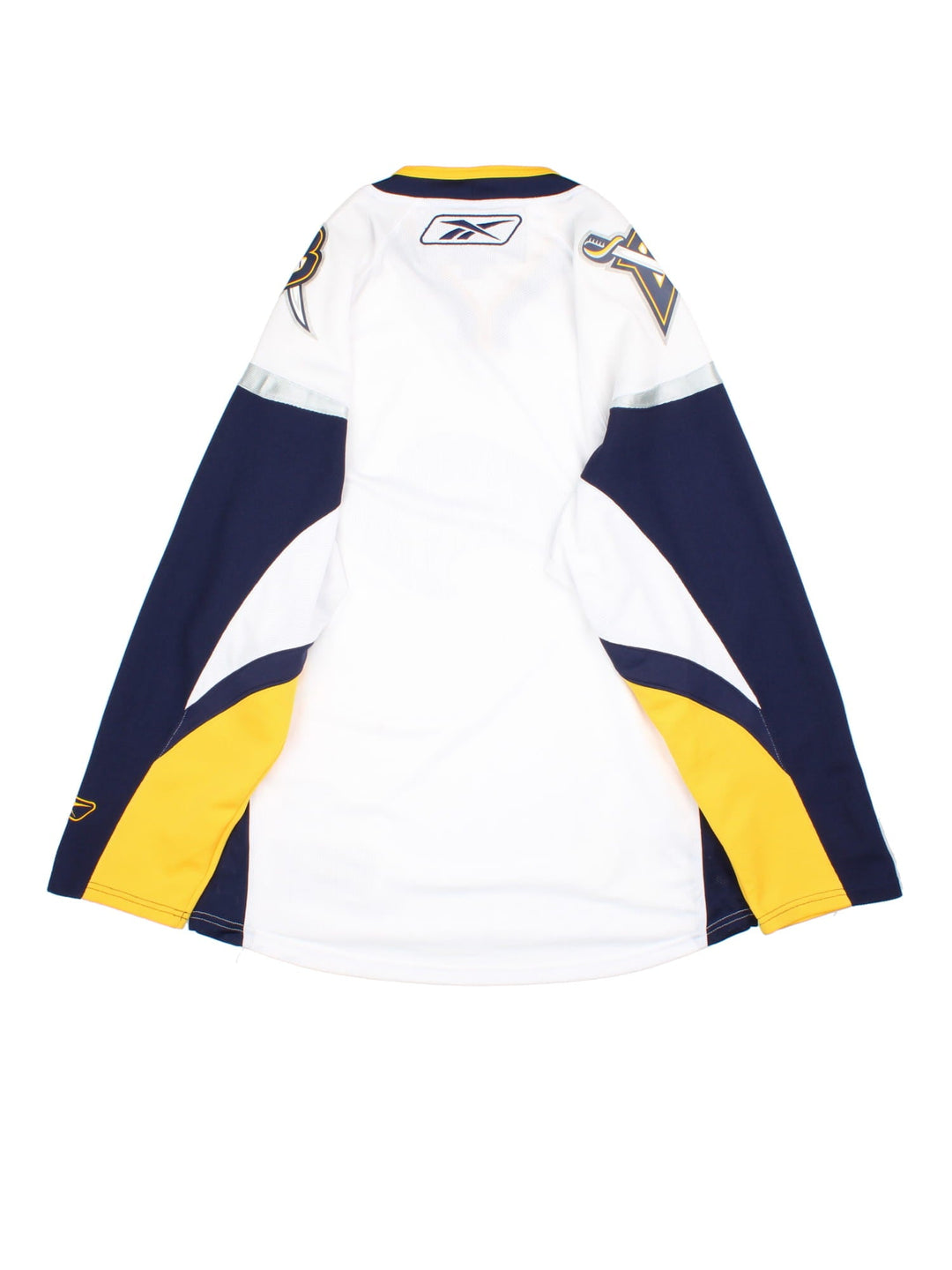 Buffalo Sabers Reebok NHL Jersey in the white colourway, features large logo on the front and shoulders with blue,yellow and silver striped panelling.