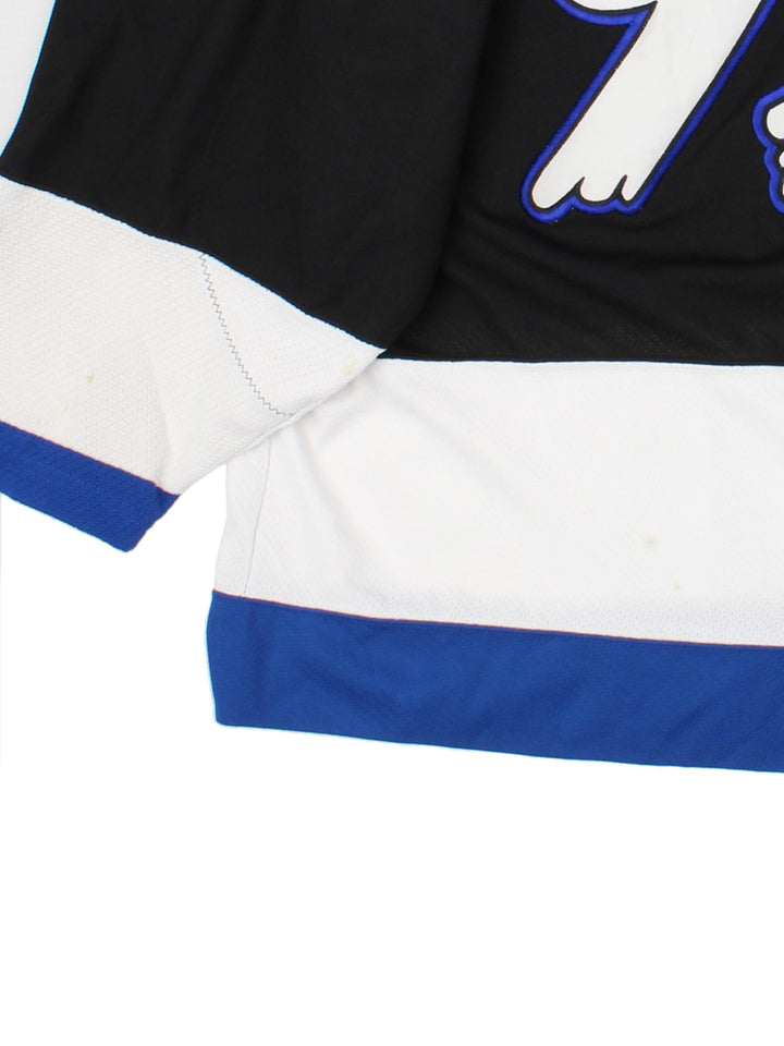 Tampa Bay Lighning Starter Ice Hockey Jersey in the black colourway with white and blue panelling. Features large embroidered logos on the front and sleeves. Player name PUPPA and number #93 on the back.