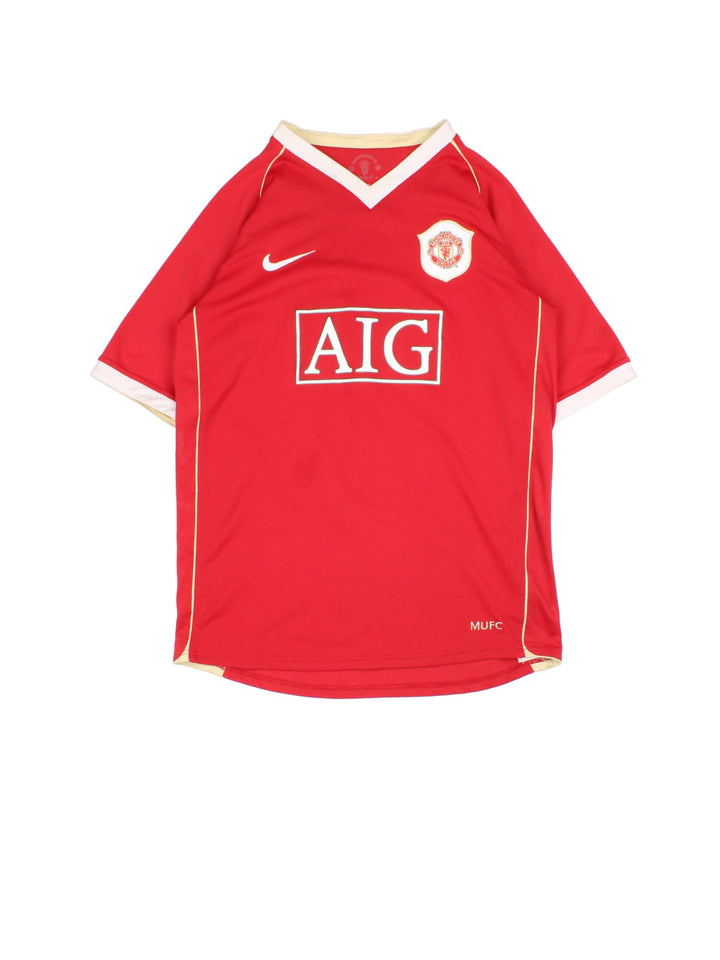 Manchester United 2006-07 Nike Football Shirt in the red home kit colourway, features embroidered badge on the front and player name ROONEY and number #8 on the back.