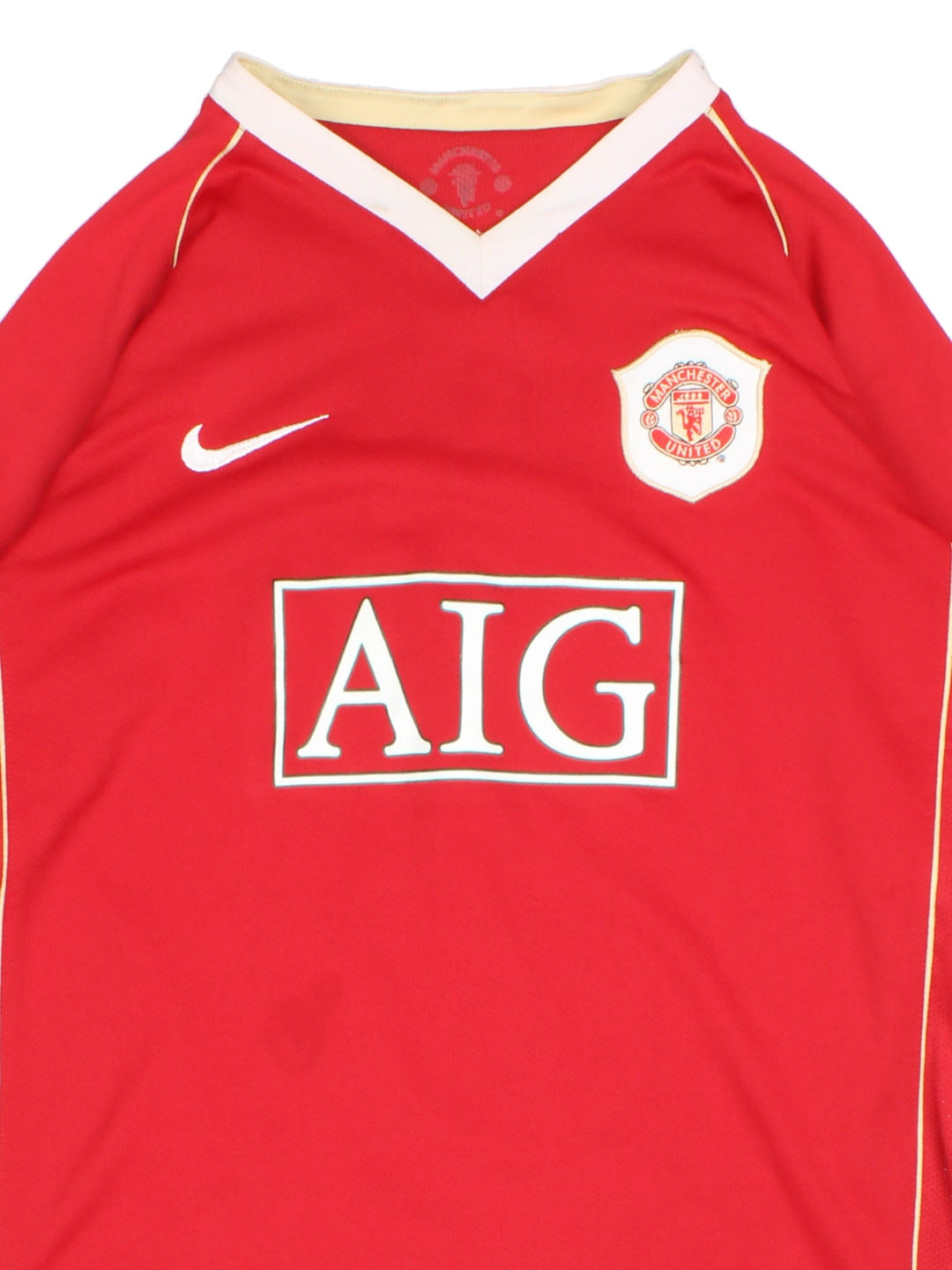 Manchester United 2006-07 Nike Football Shirt in the red home kit colourway, features embroidered badge on the front and player name ROONEY and number #8 on the back.