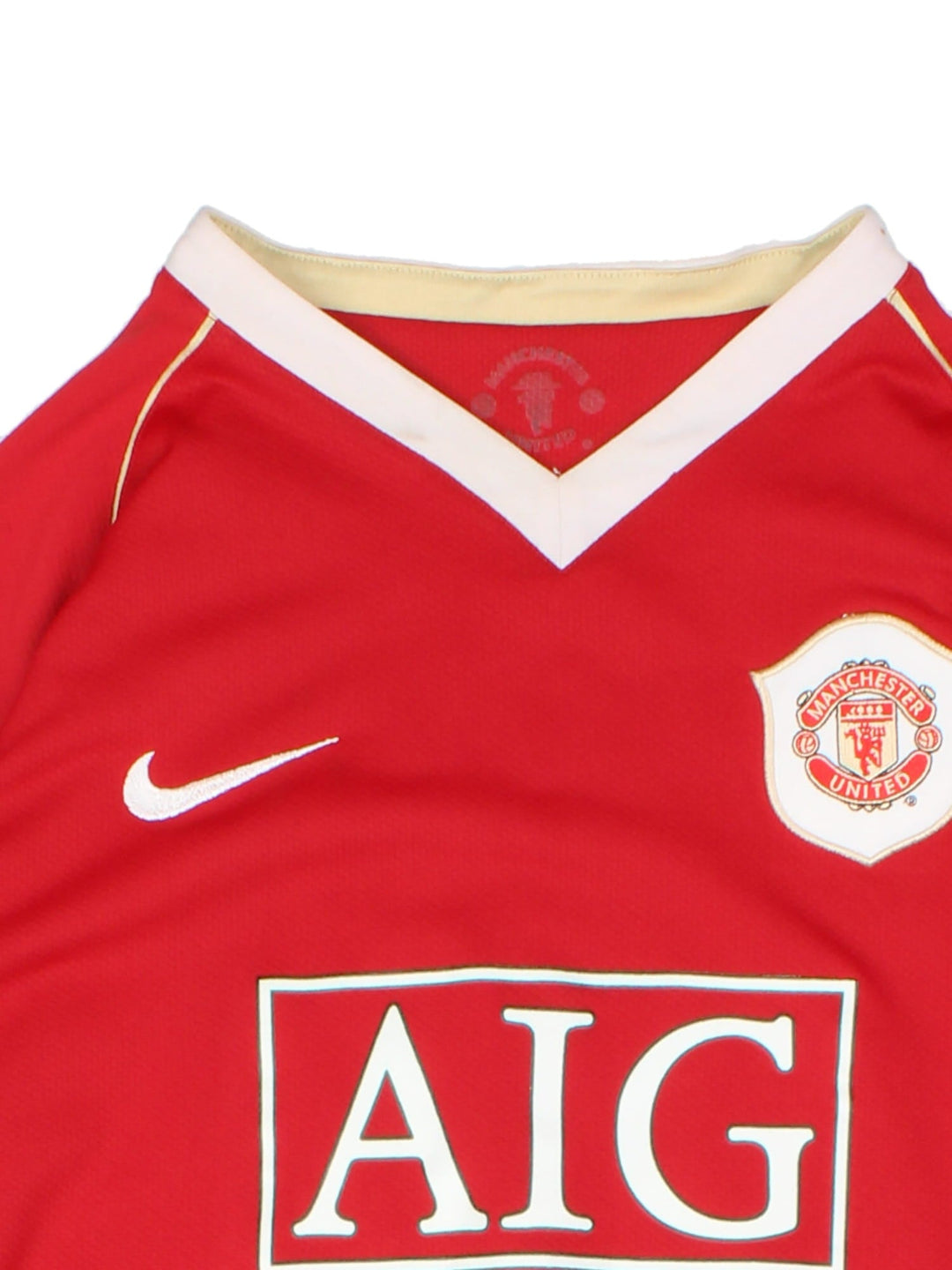 Manchester United 2006-07 Nike Football Shirt in the red home kit colourway, features embroidered badge on the front and player name ROONEY and number #8 on the back.