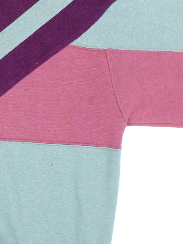 Vintage Lotto Outdoor Sweatshirt popper fastening in purple/pink/green colourway, with fleece panelling and branding embroidered on front.