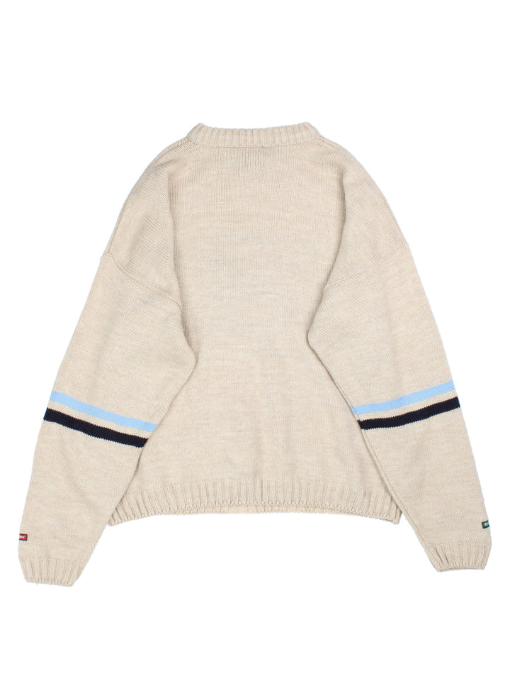 90's Kickers Jumper in tan/blue colourway, spellout branding on front.