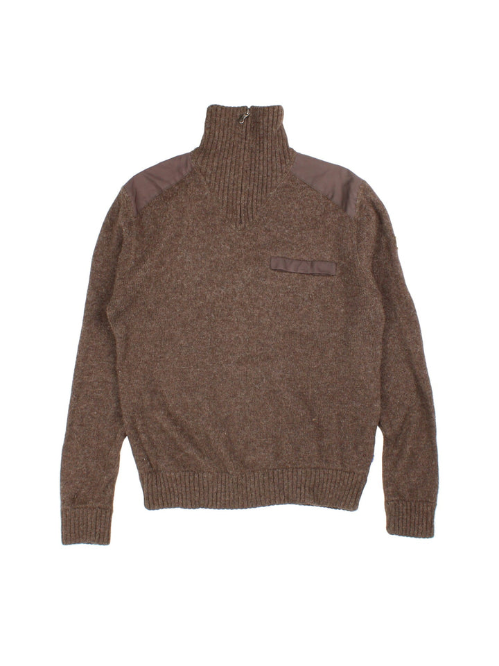 Fjallraven 1/4 Zip Jumper in brown colourway, shoulder patches and front zip pocked detail.