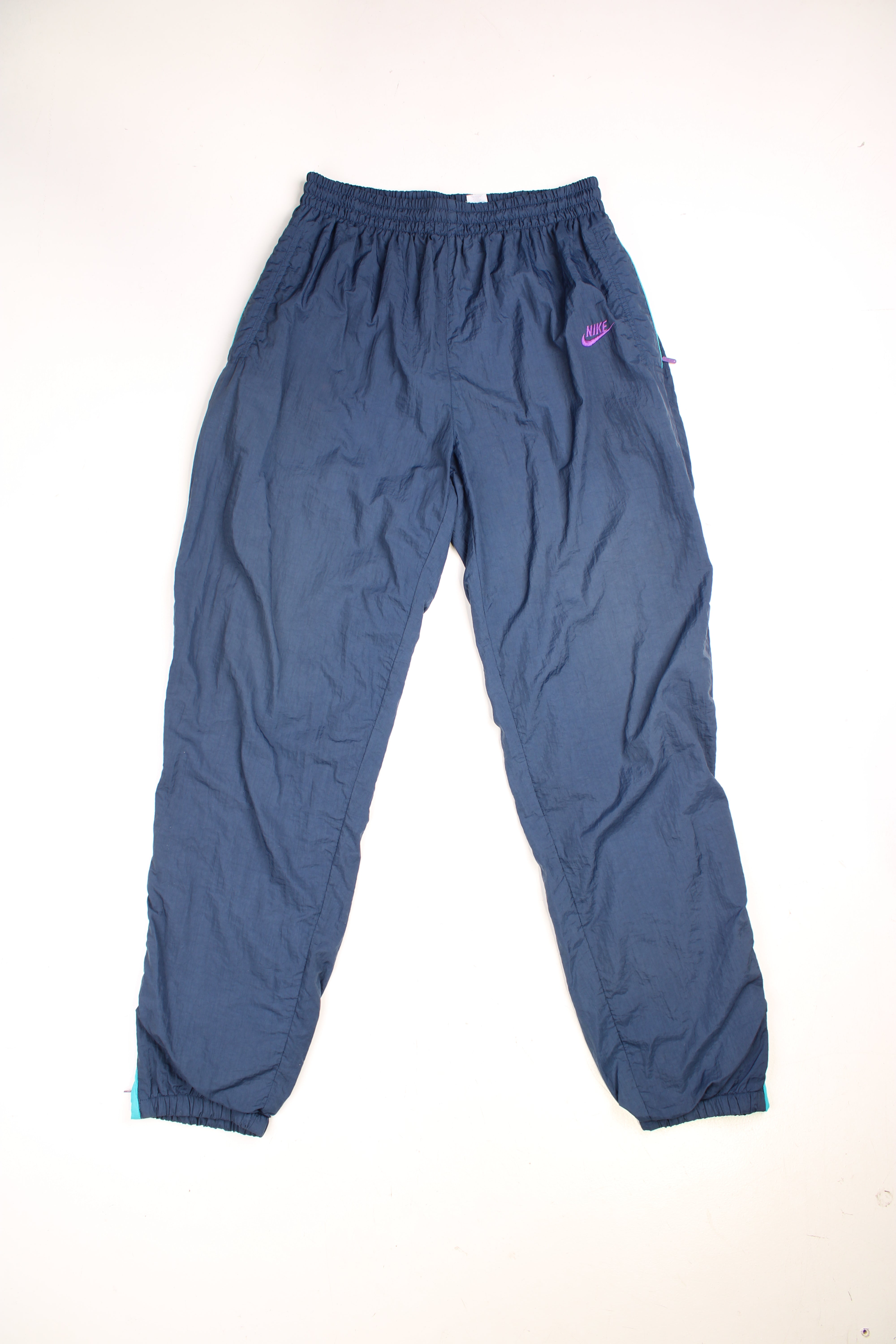 Nike nylon tracksuit bottoms deals