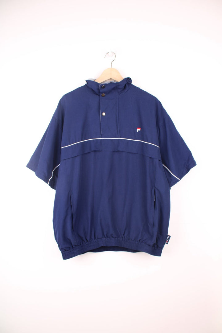 Fila Golf pullover tracksuit top/windbreaker with quarter zip. Features embroidered logo on the chest, pockets and zip off sleeves.