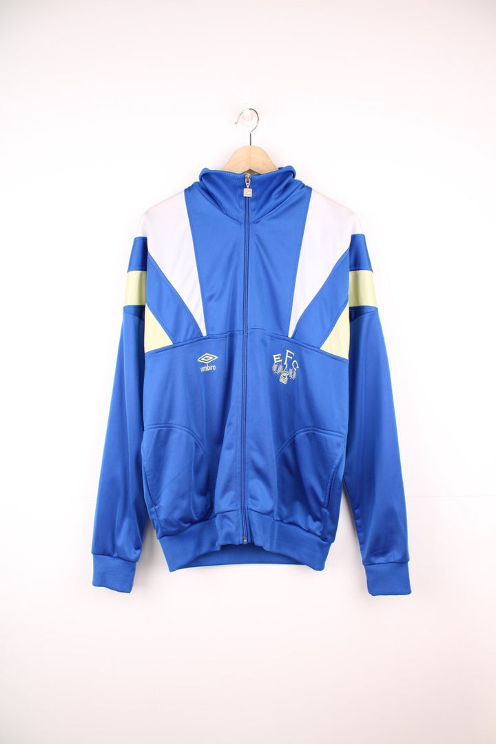 Vintage 1988-90 zip through Everton Umbro Tracksuit Top in blue, white and yellow. Features both embroidered logos on the front. 