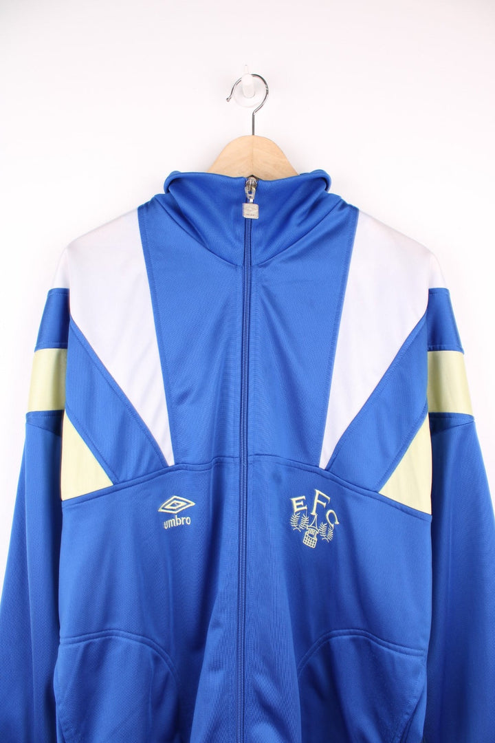 Vintage 1988-90 zip through Everton Umbro Tracksuit Top in blue, white and yellow. Features both embroidered logos on the front. 