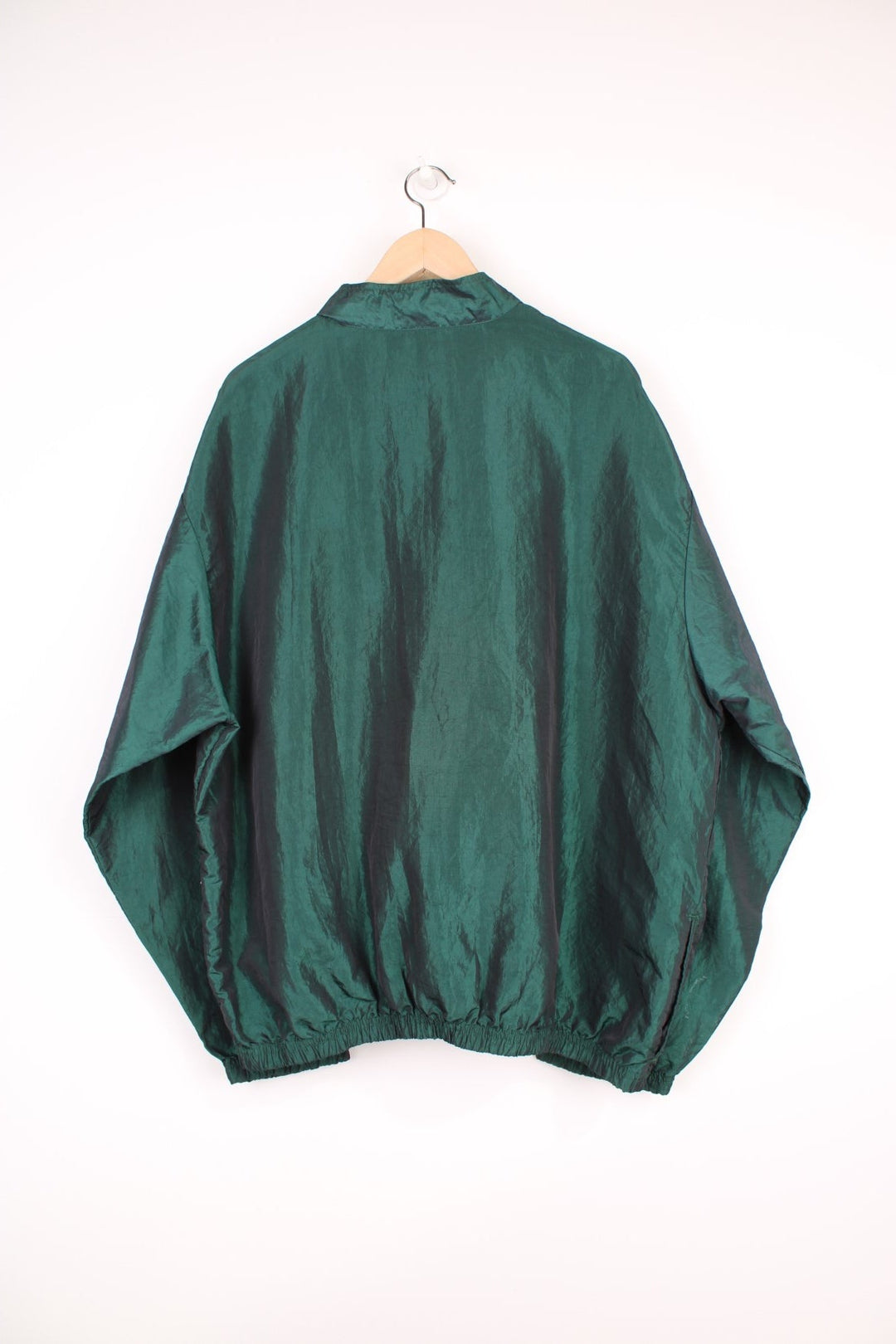 Vintage 90's Surf Style lightweight metallic green windbreaker style pullover with spell-out logo on the front