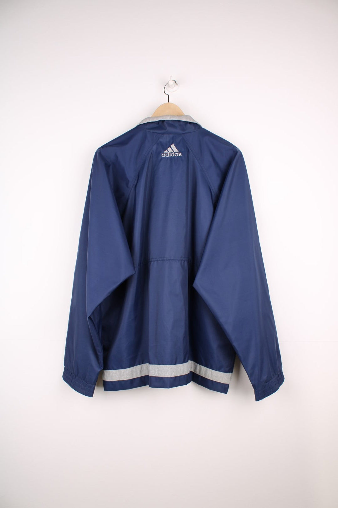 Blue, grey and white vintage Adidas zip through tracksuit top. Features large embroidered logo. 