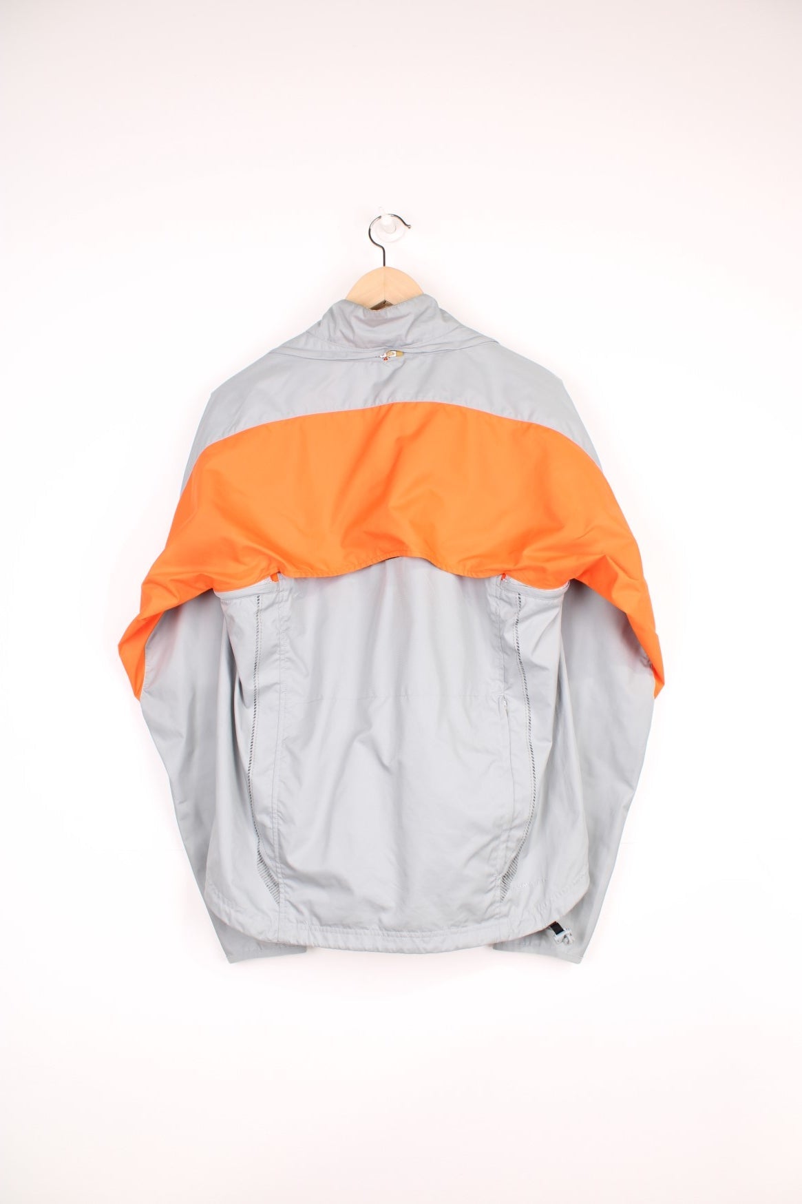 Nike Clima Fit grey zip through lightweight track jacket, with removable zip off sleeves, drawstring waist and high-vis orange detailing 