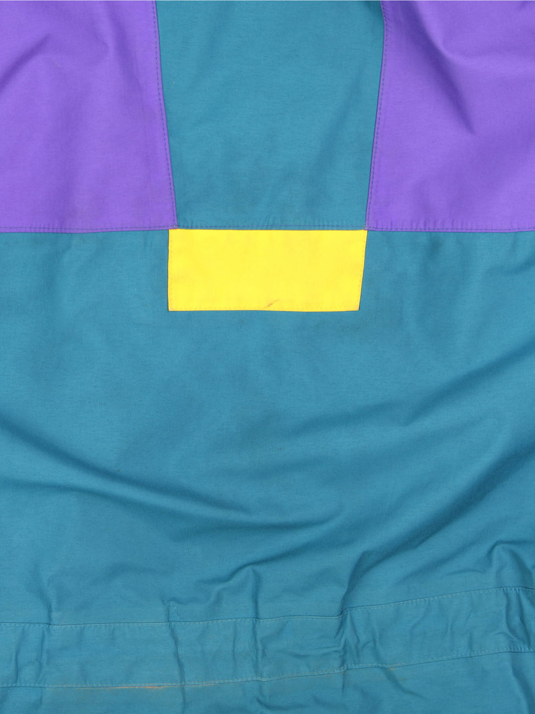 Vintage Berghaus Trango Jacket in a blue, purple and yellow colourway. Zips and buttons up, has multiple pockets, hooded, and the logo embroidered on the front.