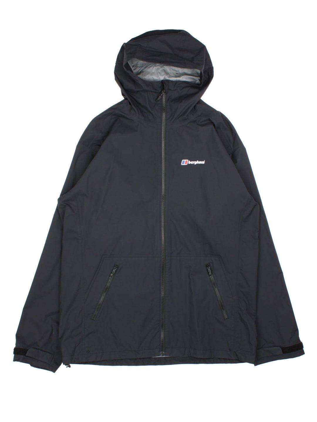 Berghaus Deluge Light Jacket in a black colourway. Zips up and has side pockets, hooded, and has the logo printed on the front.