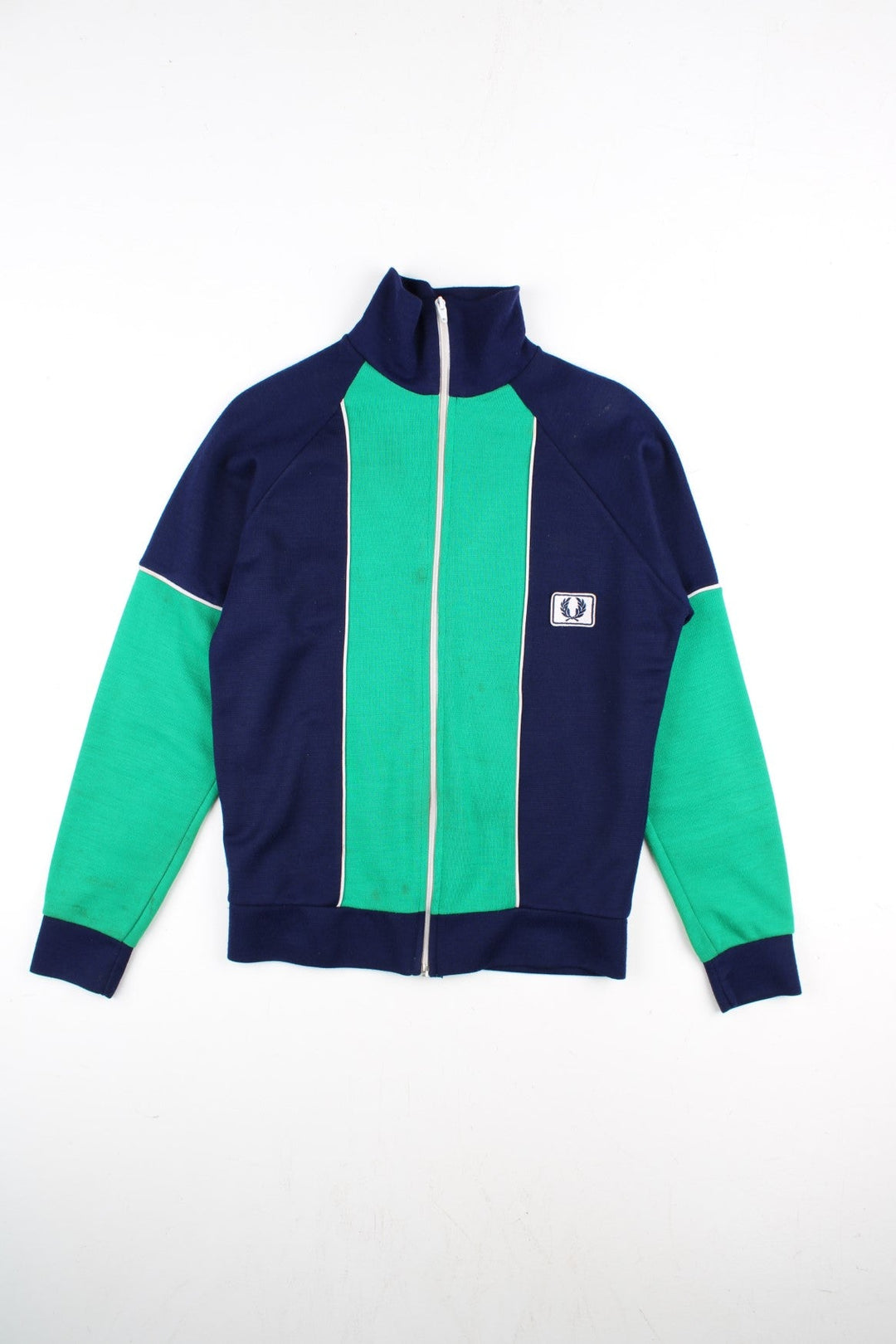 Vintage Fred Perry Track Top in a blue colourway with green panelling. Full zip design and small embroidered logo on the front.