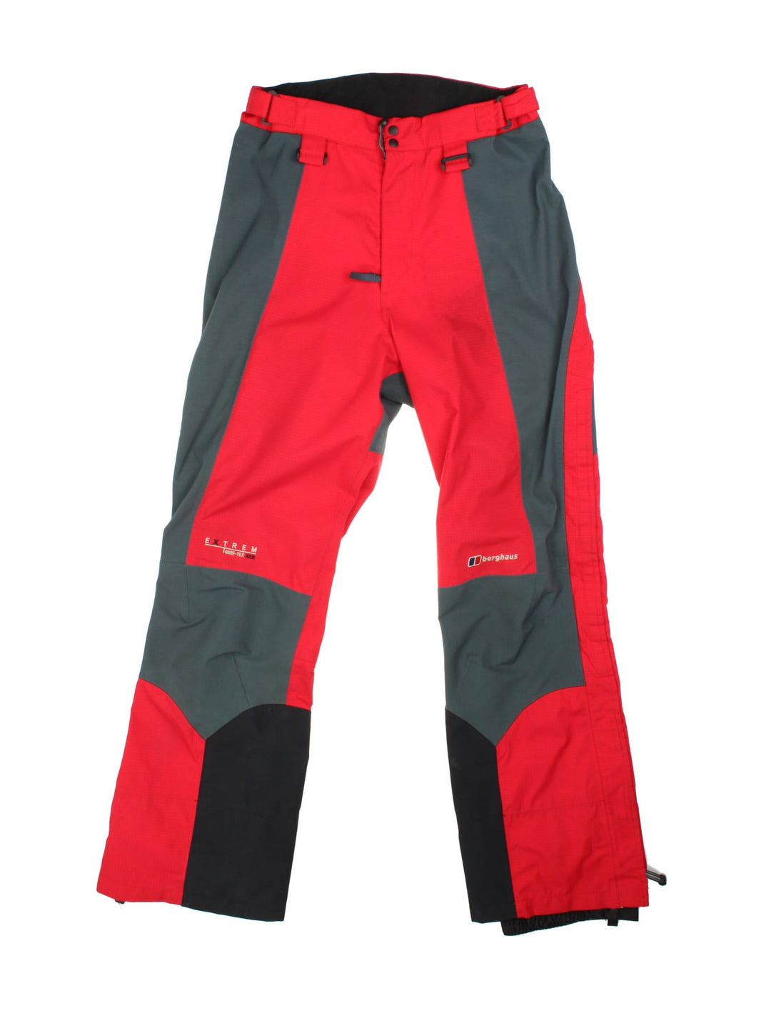 Berghaus Extrem Gore-Tex ski/alpine zip off salopettes in red with grey and black panelling, multiple pockets, zip and snap closure, velcro waist adjusters, embroidered logos, and toggles for braces to be attached.