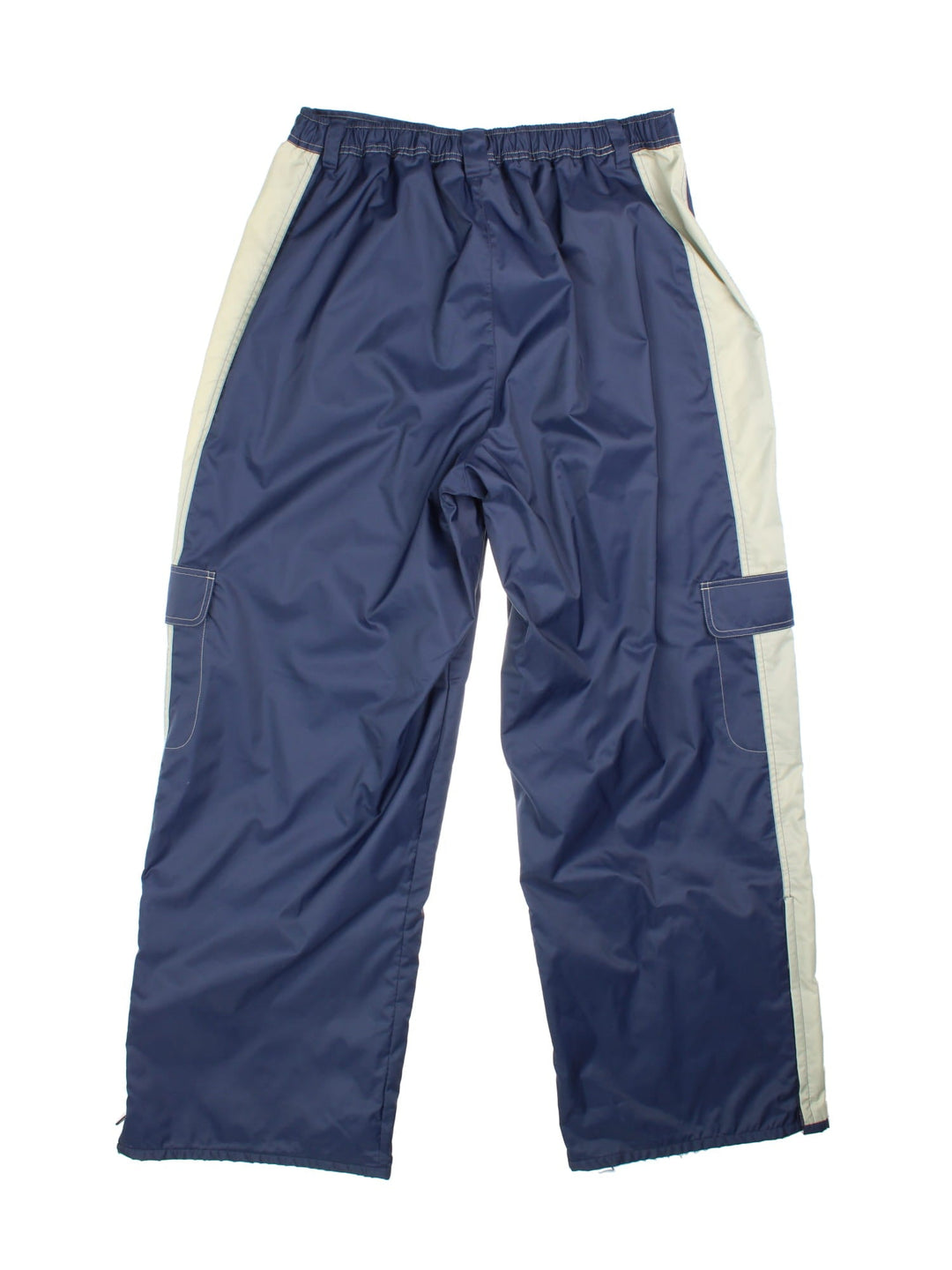 Nike tracksuit bottoms in navy blue with grey stripe detailing, multiple pockets, white contrast stitching, embroidered logos and zip, snap and button closure.