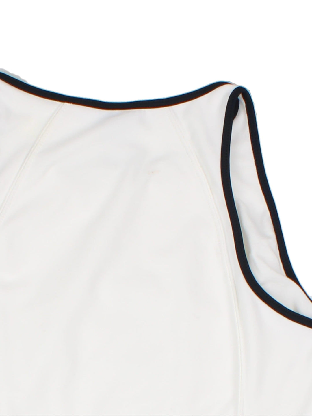 Nike A-line tennis dress in white with black piping and a small embroidered swoosh on the chest.