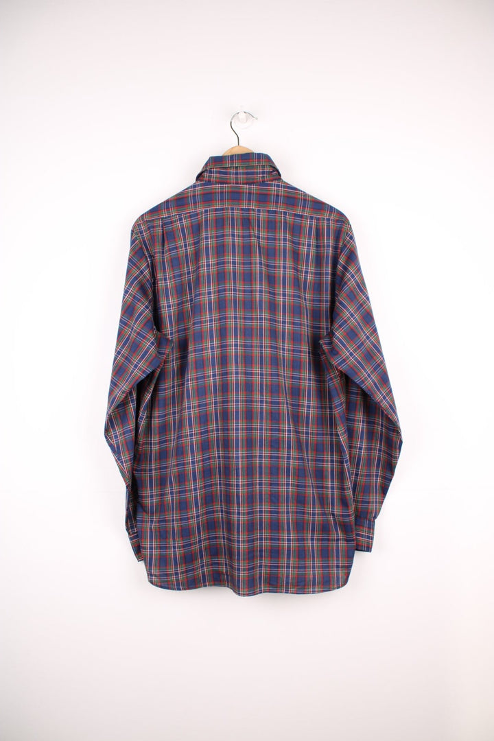 Levi's navy blue, red and green plaid shirt with one flap pocket.  