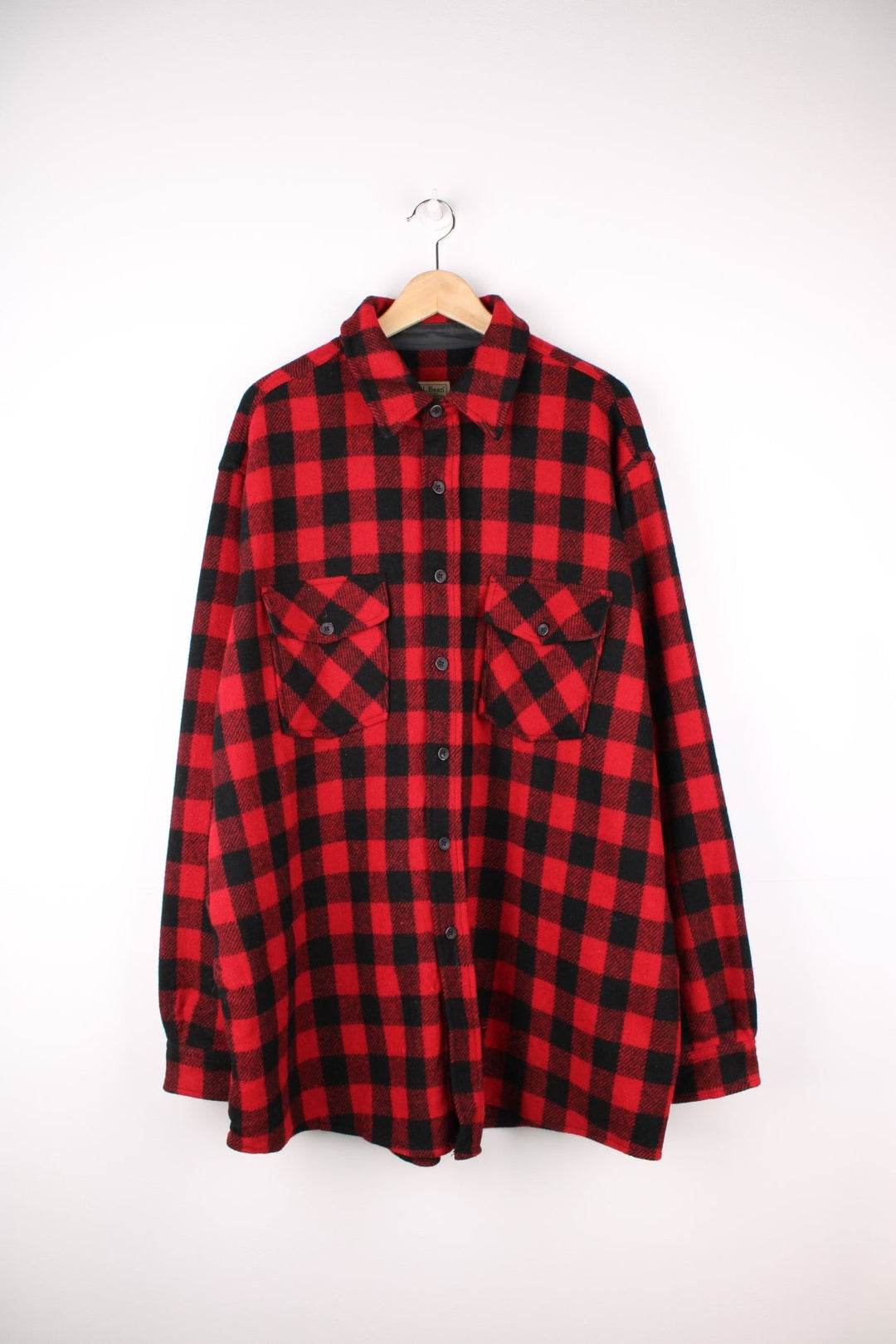 Red and black plaid L.L. Bean wool shirt with two breast pockets. 