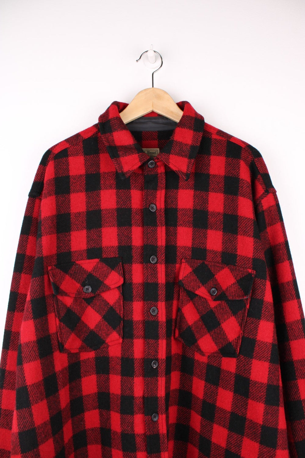 Red and black plaid L.L. Bean wool shirt with two breast pockets. 