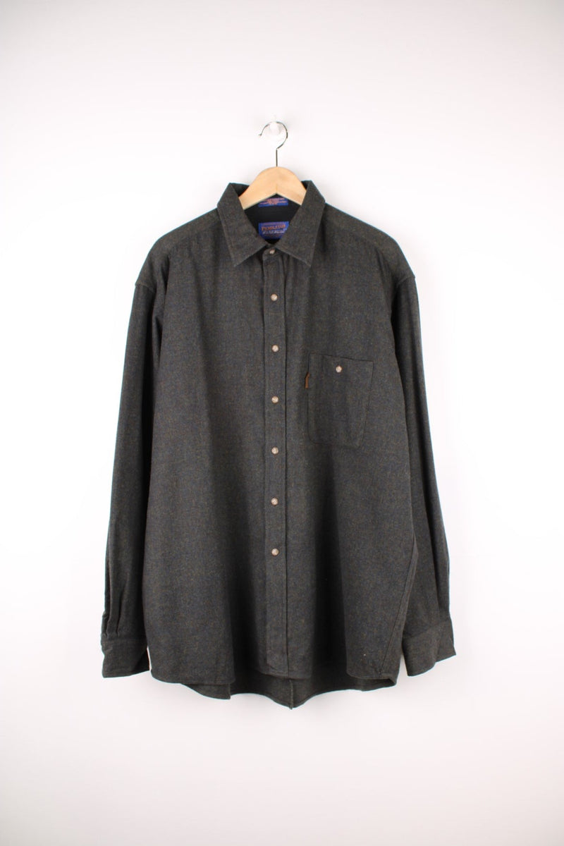 Grey Pendleton shirt, 100% wool with one buttoned flap pocket. 