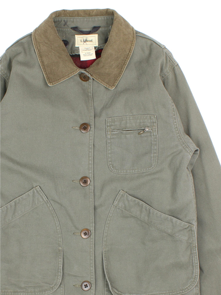 L.L Bean Field Coat in a green colourway. Buttons up and has multiple pockets, detachable blanket lining, and has a corduroy collar.