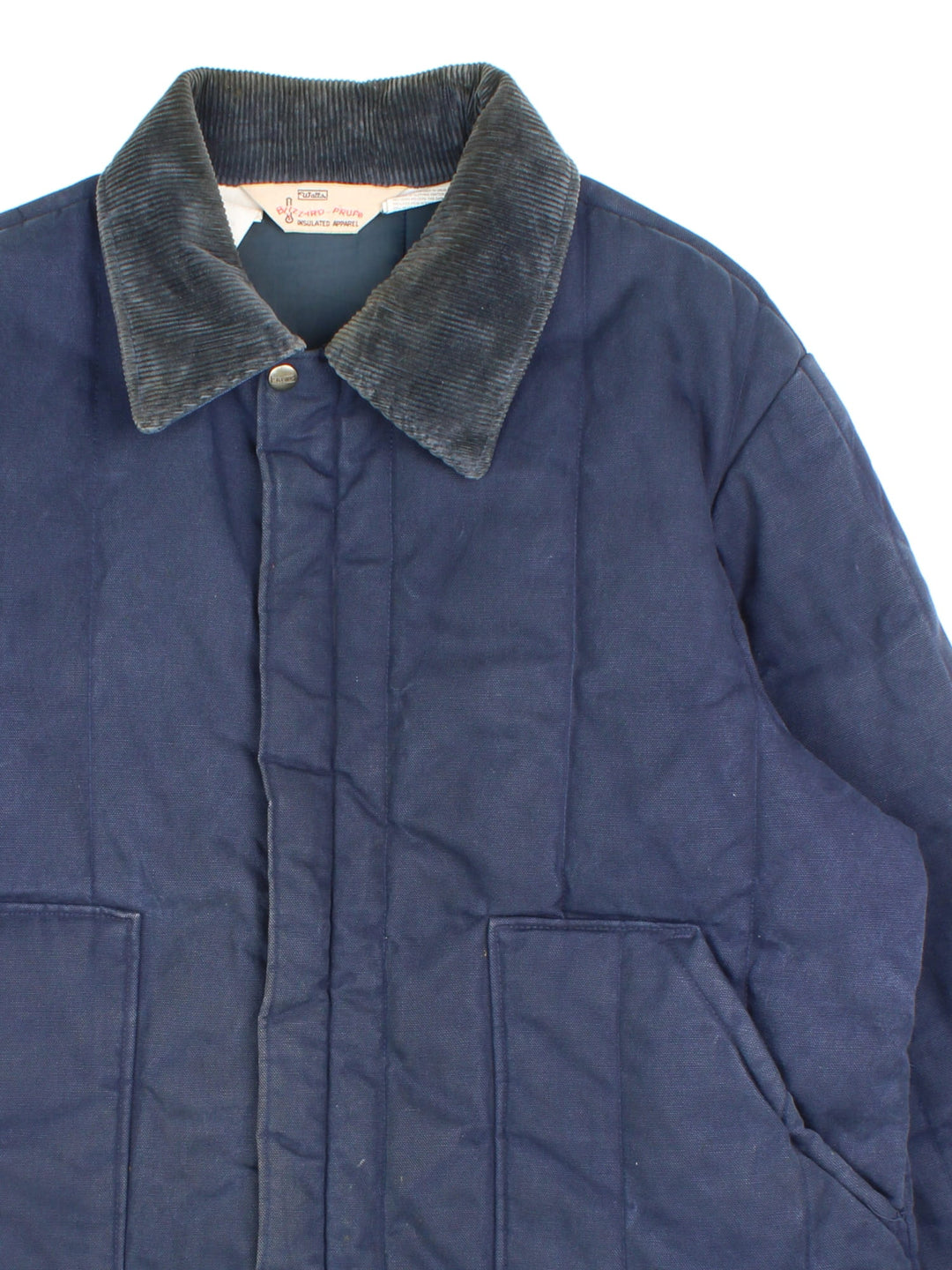 Vintage Walls Blizzard-Pruf Jacket in a navy blue colourway. Zips up and has side pockets, insulated with a quilted lining, and has a corduroy collar.