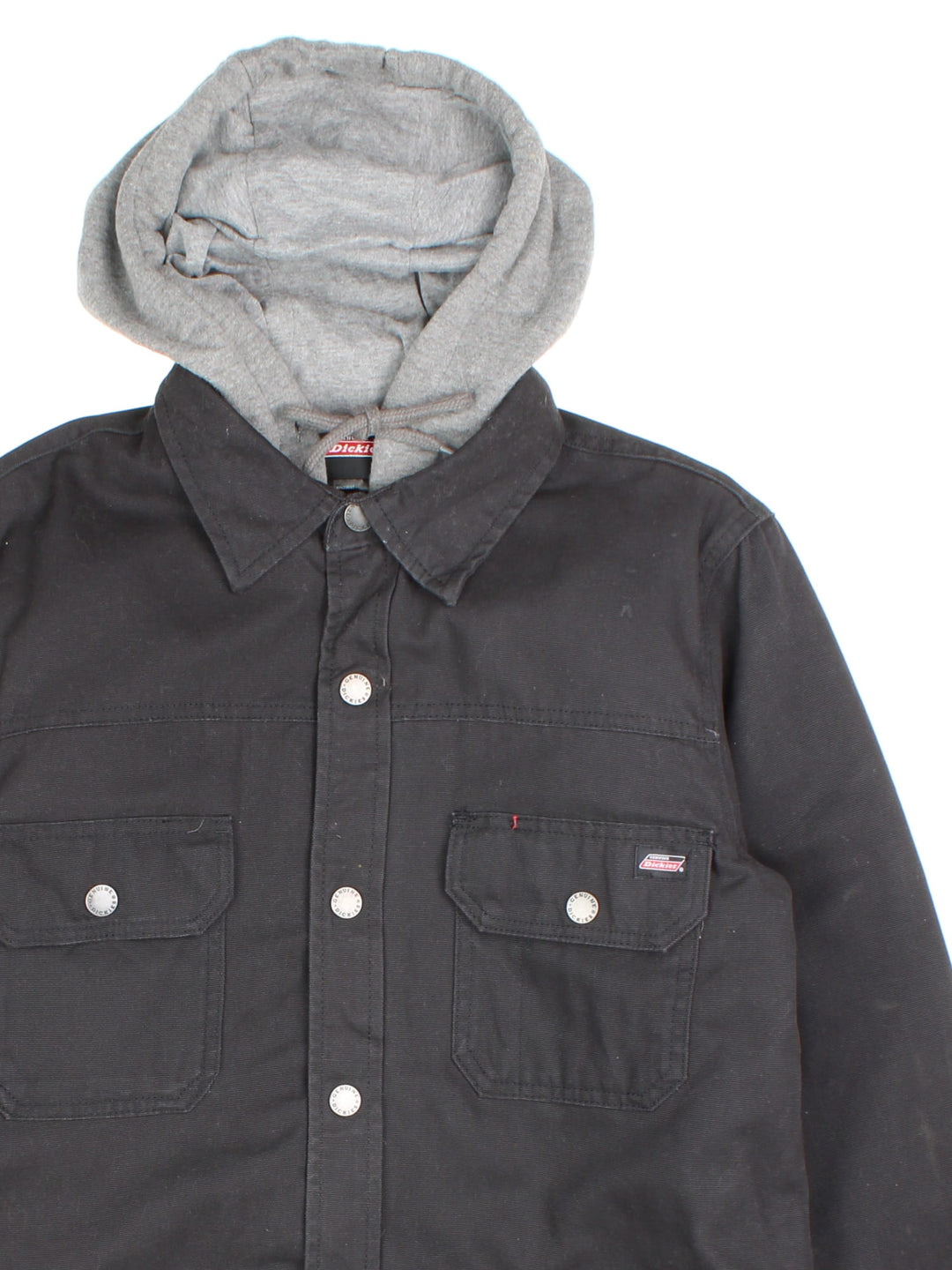 Vintage Dickies Hooded Jacket in a black colourway with grey hood. Zips and buttons up, has multiple pockets, insulated with a quilted lining, and has the logo embroidered on the front.