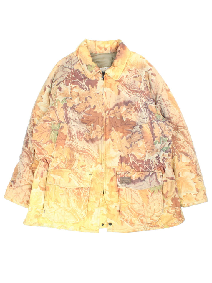 Vintage Walls Forest Camo Outdoors Jacket in a orange, brown and yellow patterned colourway. Zips up and has multiple pockets, insulated with a quilted lining, and has the logo embroidered on the front.