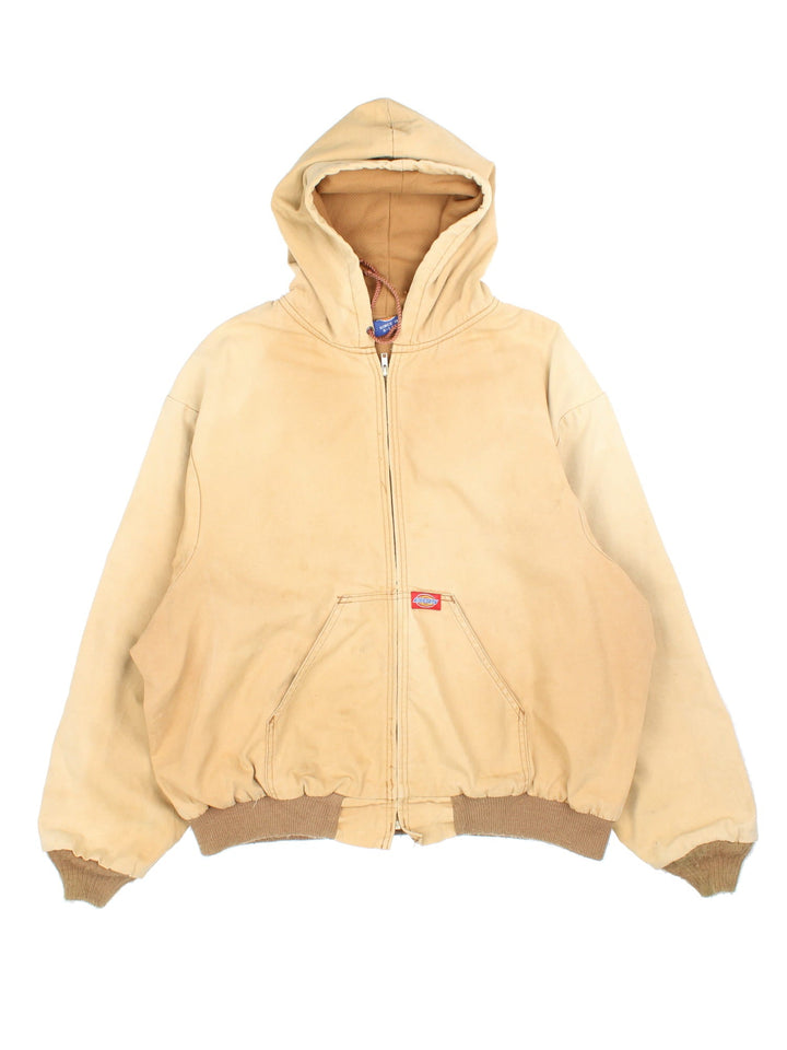 Vintage Dickies Workwear Jacket in a tan colourway. Zips up and has side pockets, hooded, and has the logo embroidered on the front.