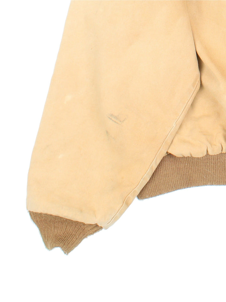 Vintage Dickies Workwear Jacket in a tan colourway. Zips up and has side pockets, hooded, and has the logo embroidered on the front.