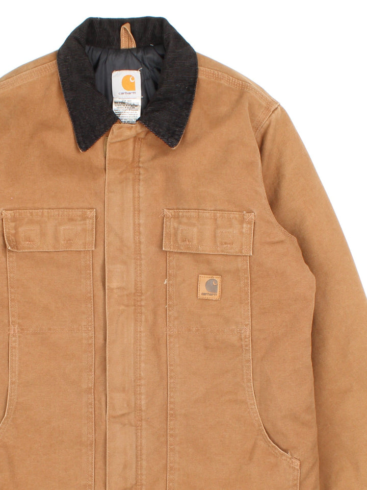 Vintage Carhartt Arctic Jacket in a brown colourway. Zips up and has multiple pockets, corduroy collar, insulated with a quilted lining, and has the logo embroidered on the front.