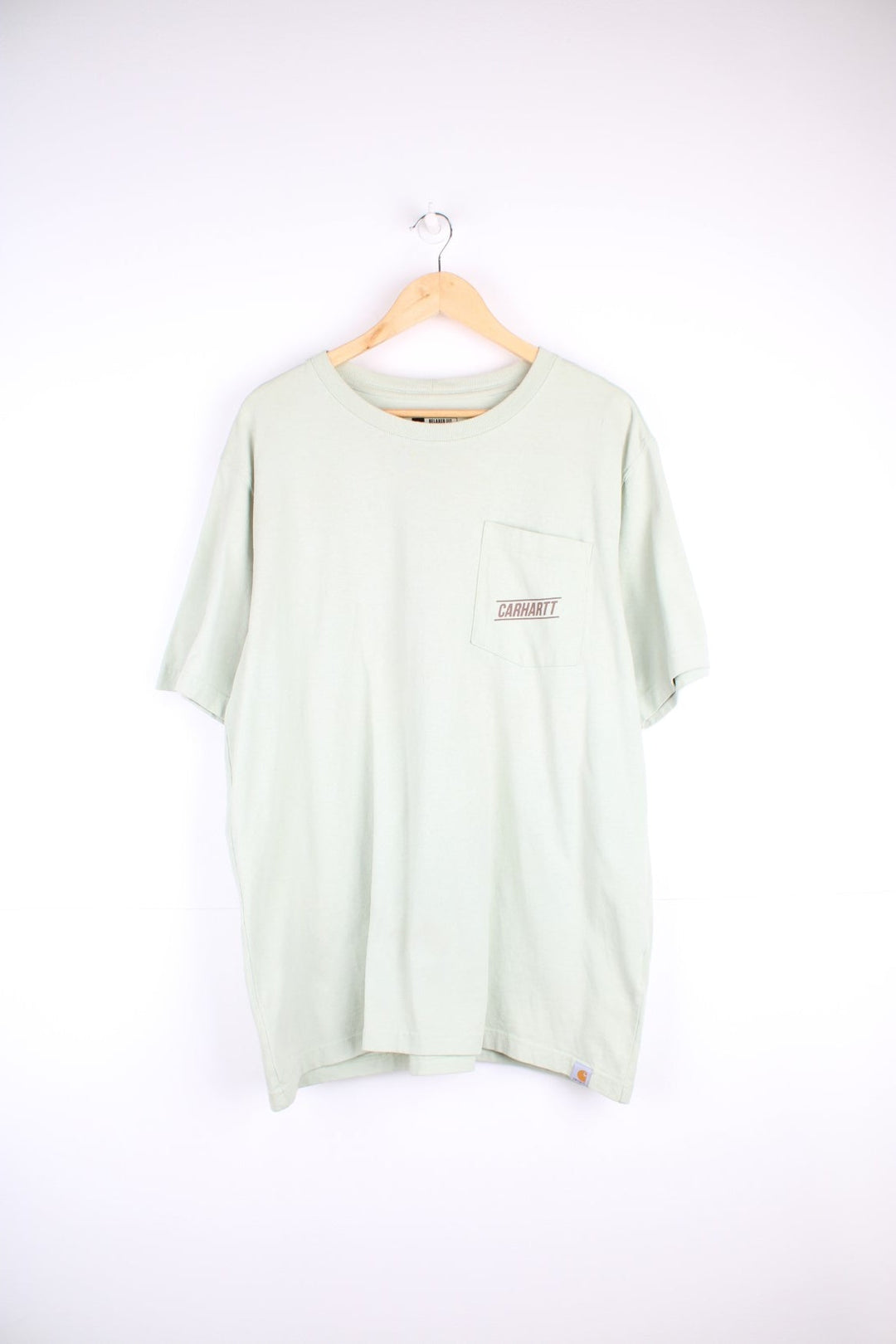 Carhartt T-Shirt in a green and brown colourway with a chest pocket, and has the logo printed on the front and back. 