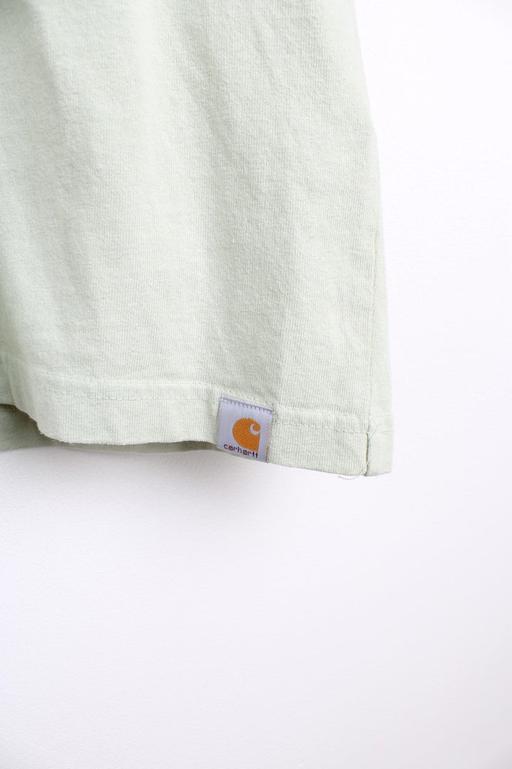 Carhartt T-Shirt in a green and brown colourway with a chest pocket, and has the logo printed on the front and back. 