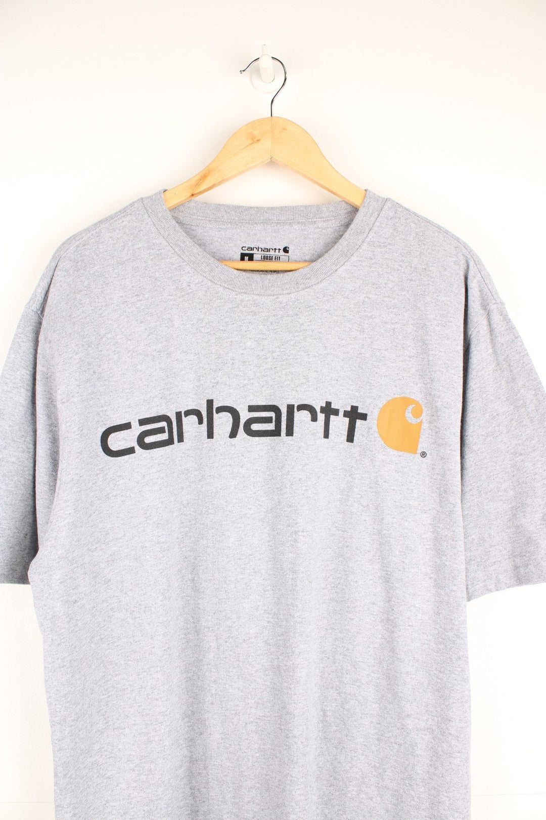 Carhartt T-Shirt in a grey colourway with the logo spell out printed across the front. 