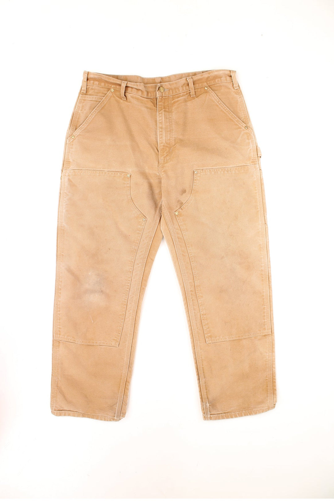 Vintage Carhartt Double Knee Trousers in a tan colourway, multiple pockets and has the logo embroidered on the back.